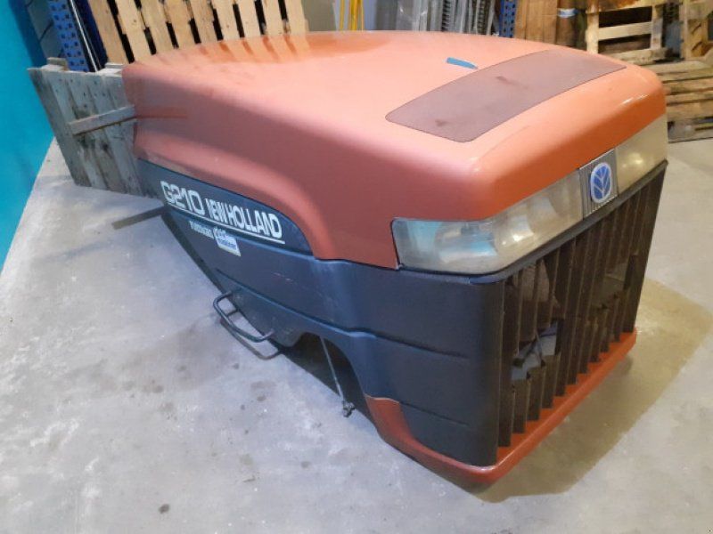 New Holland G210