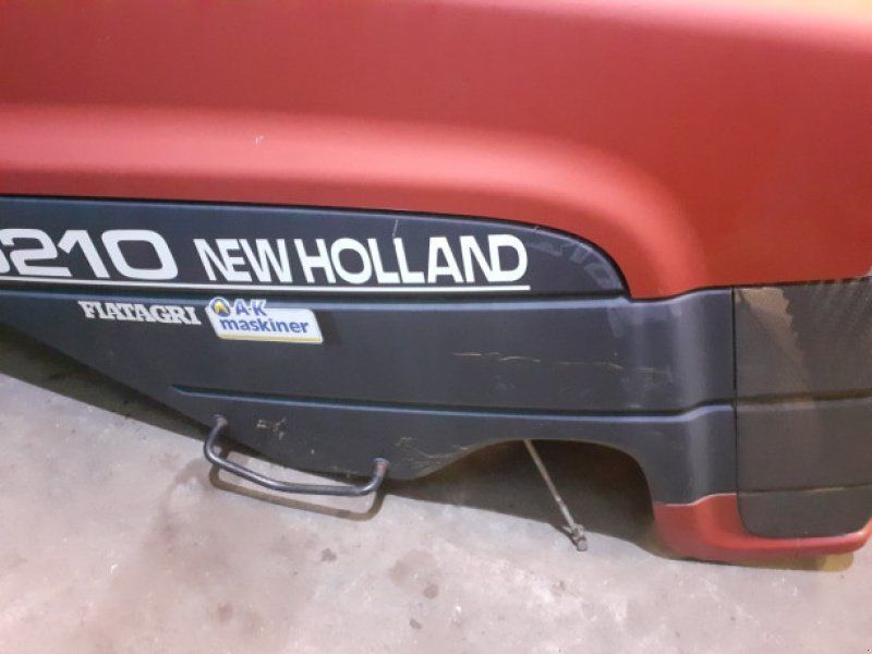 New Holland G210