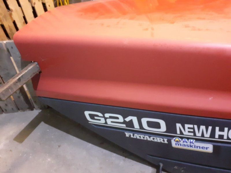 New Holland G210