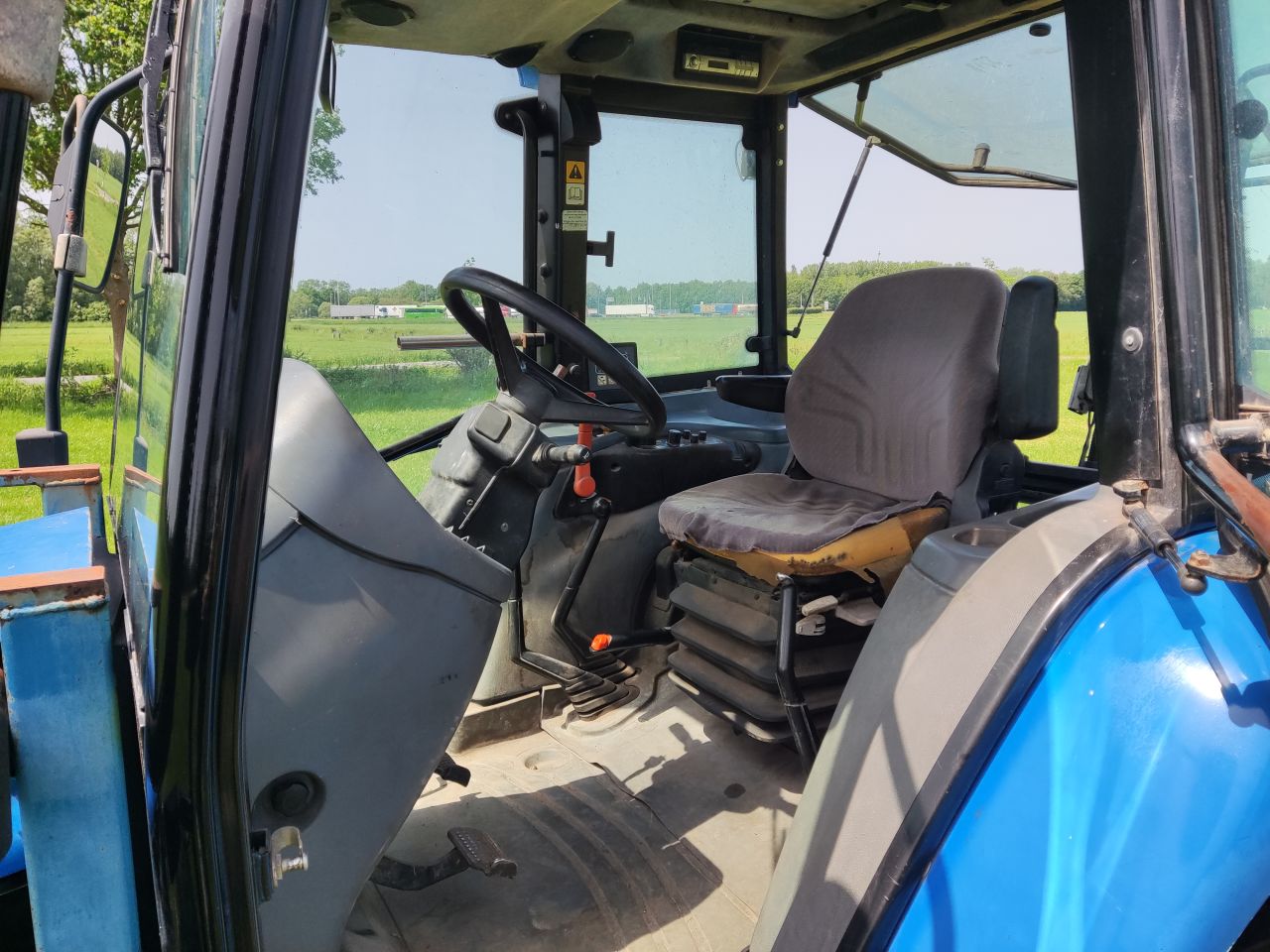NEW HOLLAND tractor (type TL90, 90 pk, 5.768 uur, 4WD,)
