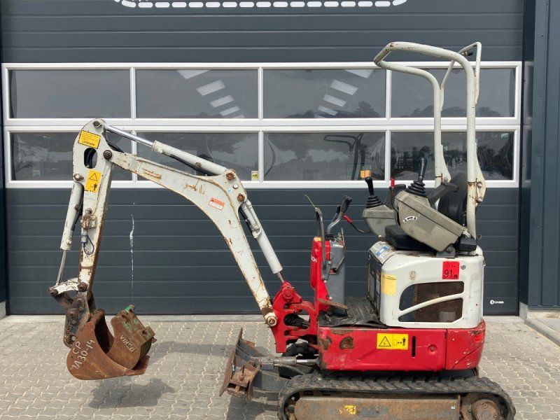 Takeuchi TB210R TB210 årg .1281 timer.