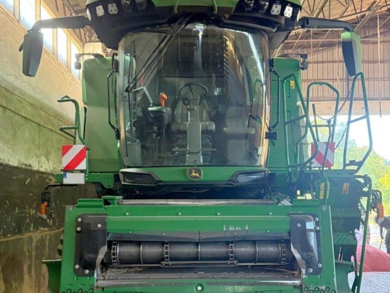 John Deere X9 mit Knickgelenk-Bandschneidwerk HD40 X-12,20 m