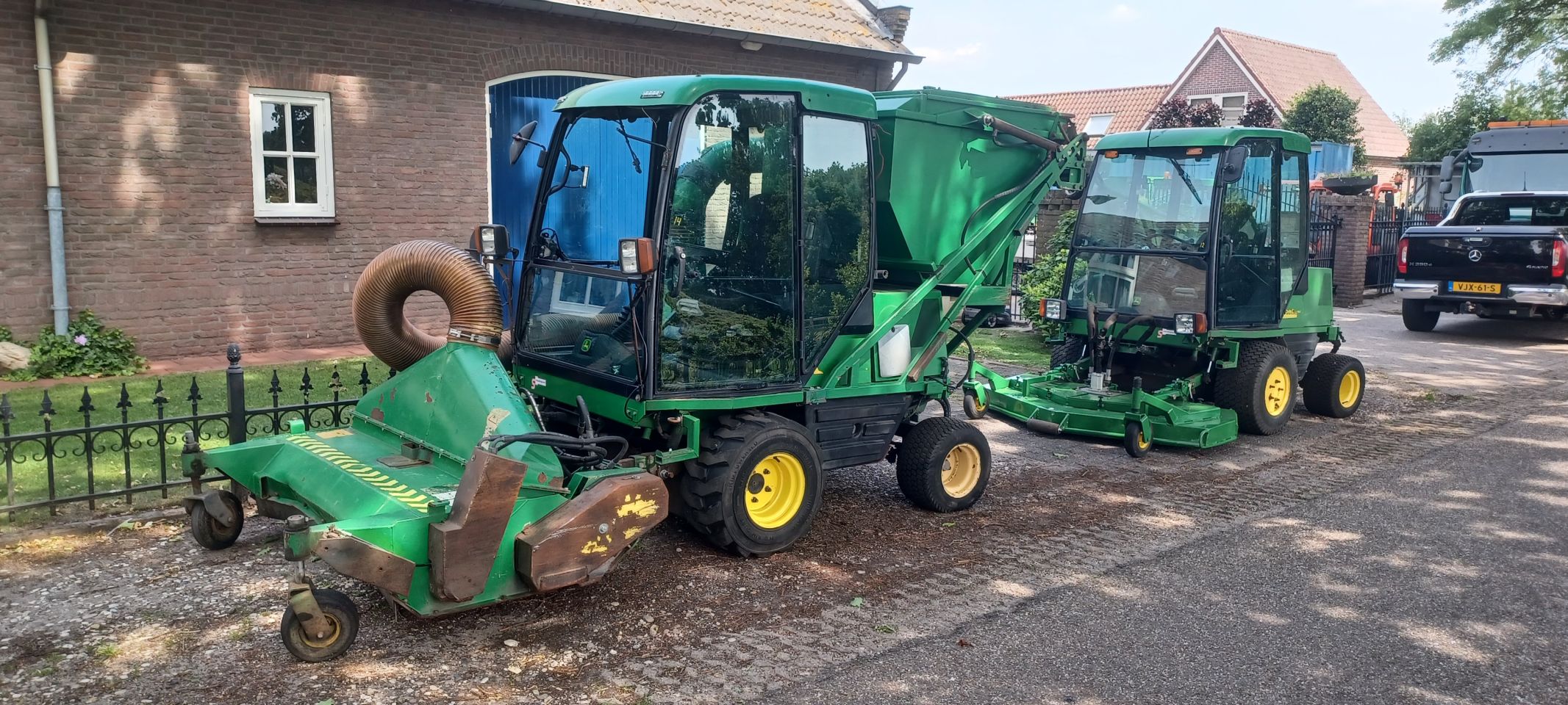John deere 1515 met kleppelmaaier+hoogkieper