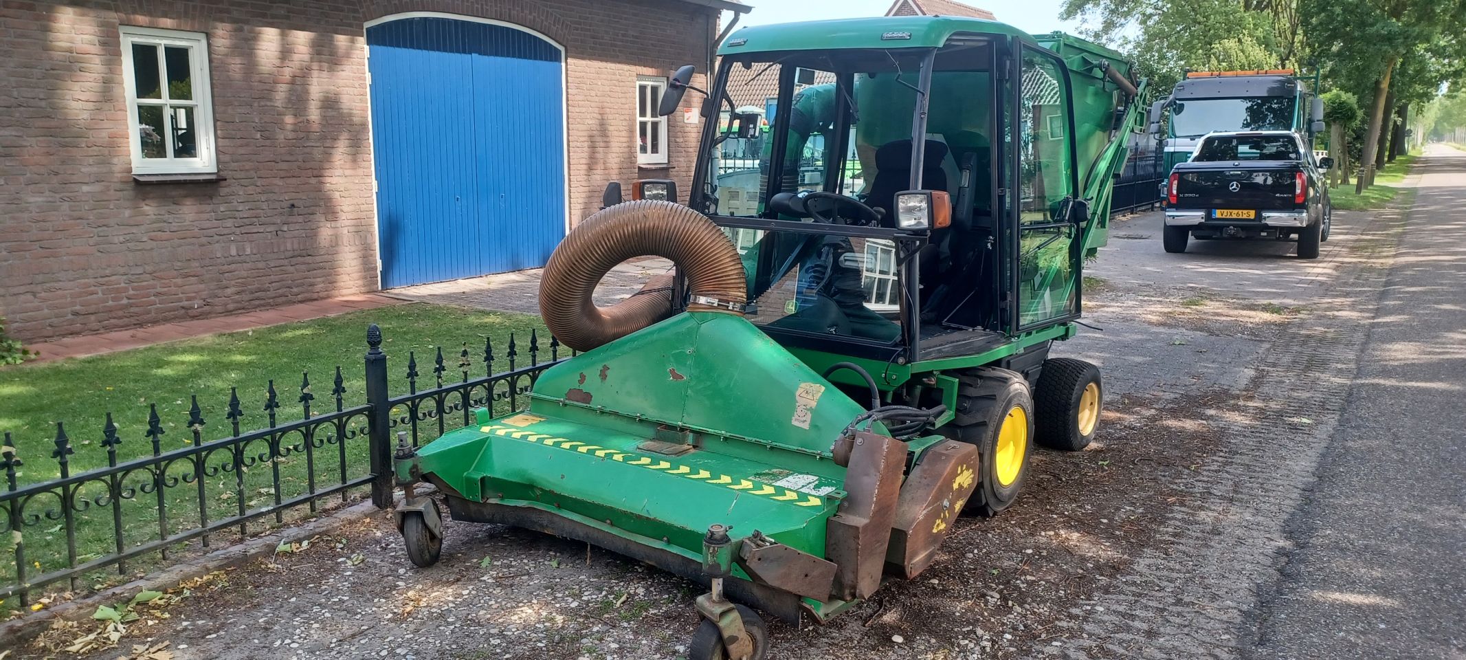 John deere 1515 met kleppelmaaier+hoogkieper