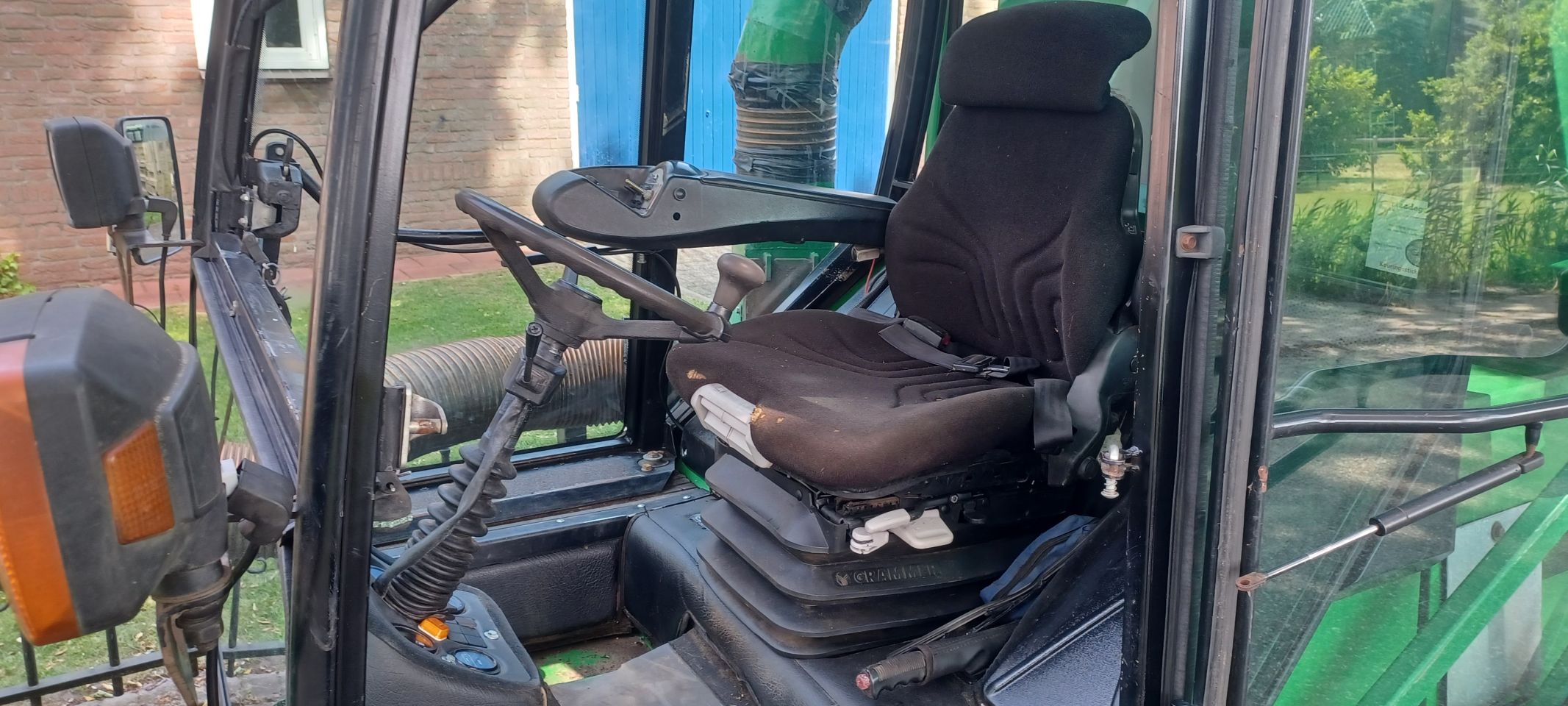 John deere 1515 met kleppelmaaier+hoogkieper
