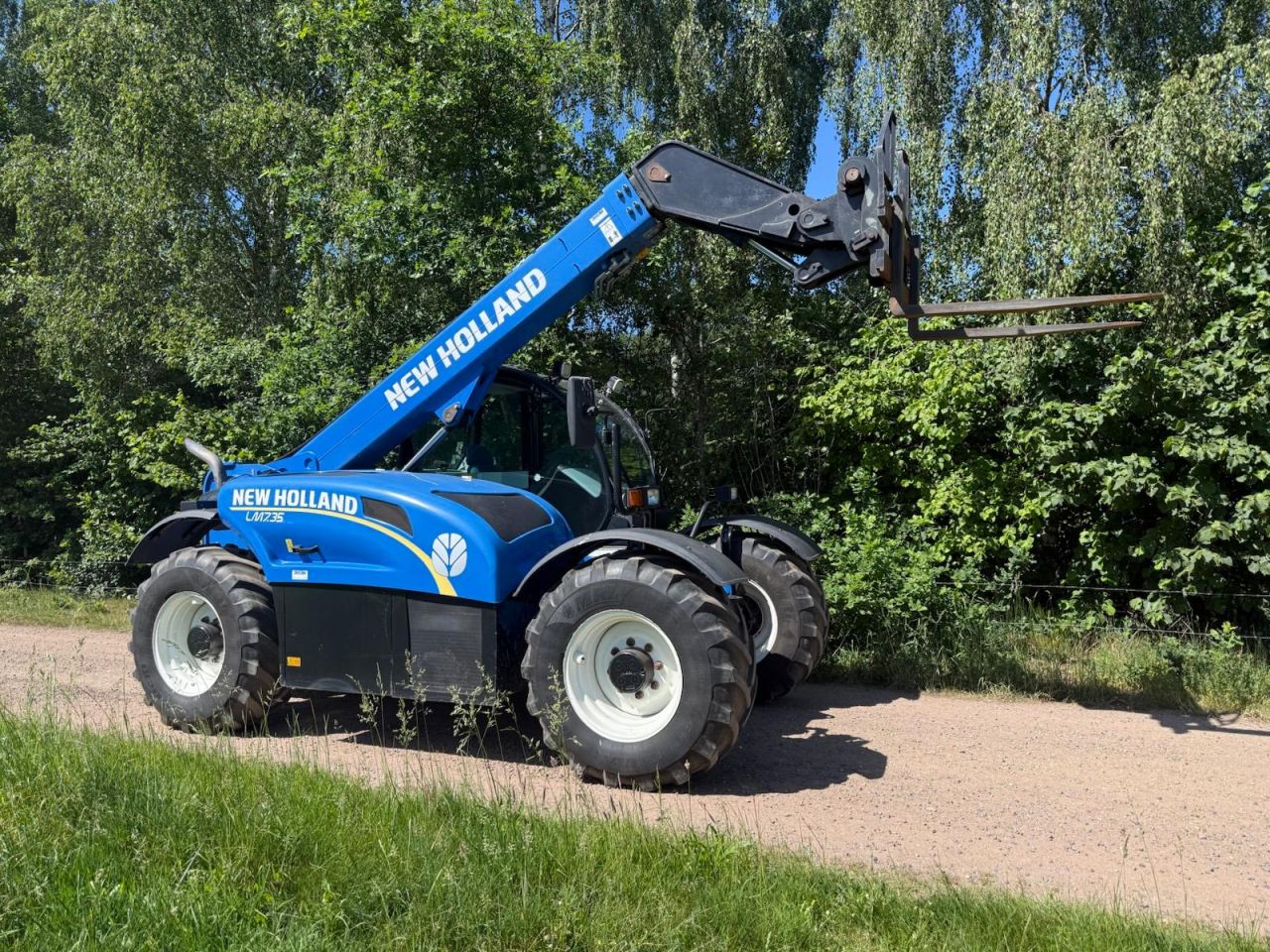 New Holland LM 7.35 verreiker