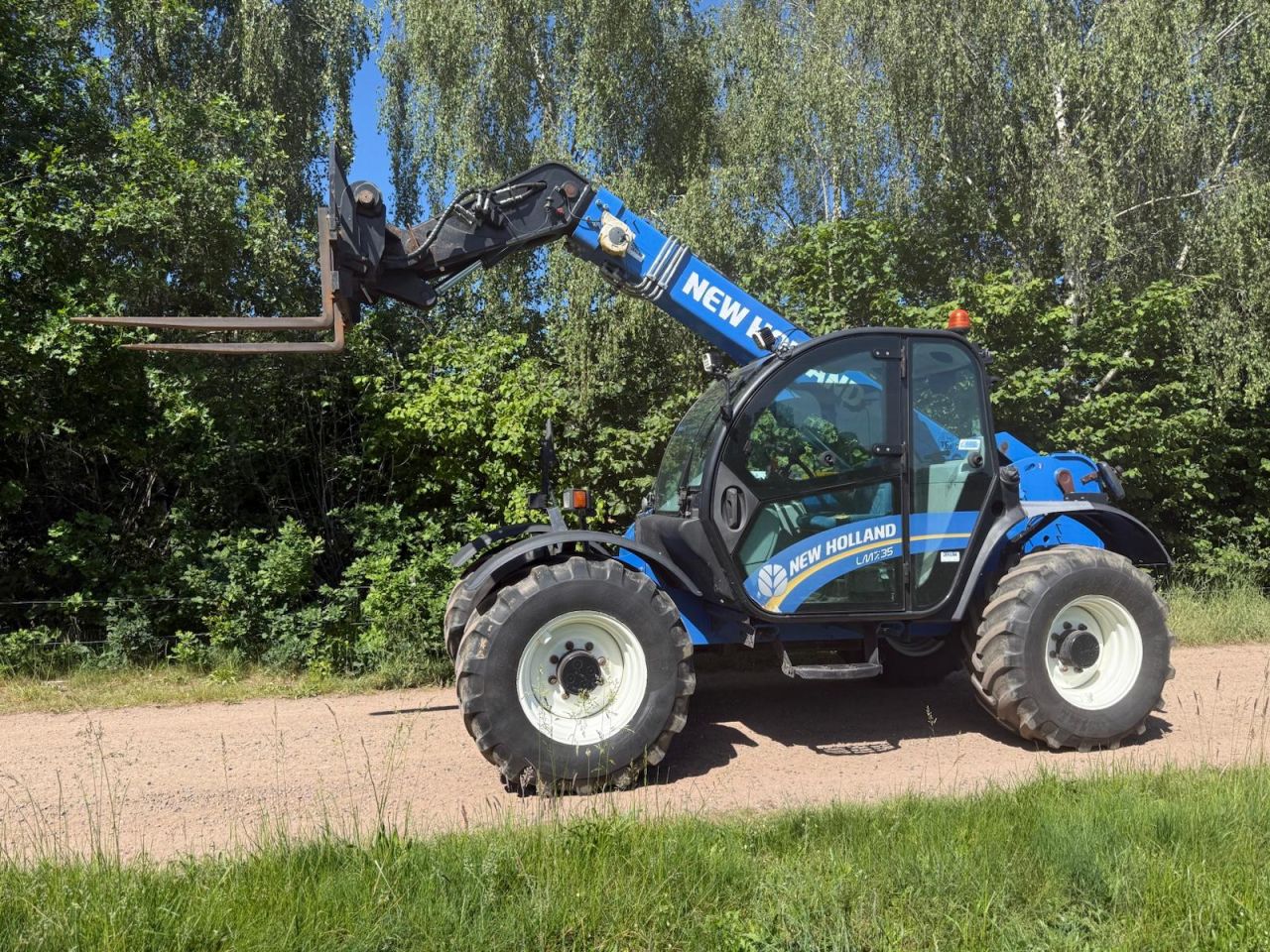New Holland LM 7.35 verreiker
