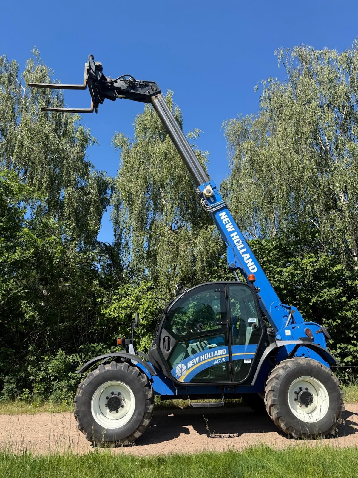 New Holland LM 7.35 verreiker