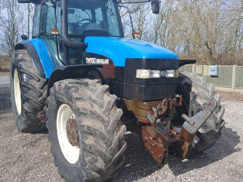 New Holland TM 150 med frontlift Range Command
