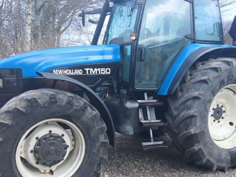 New Holland TM 150 med frontlift Range Command
