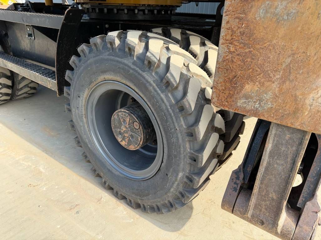 CAT M313D