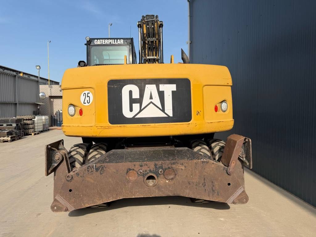 CAT M313D