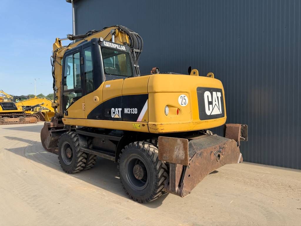 CAT M313D