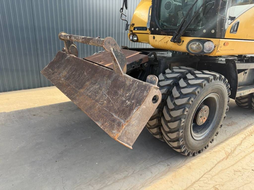 CAT M313D