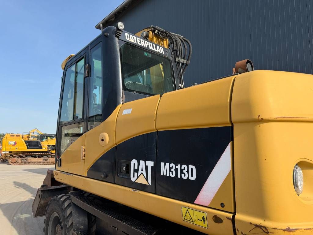 CAT M313D
