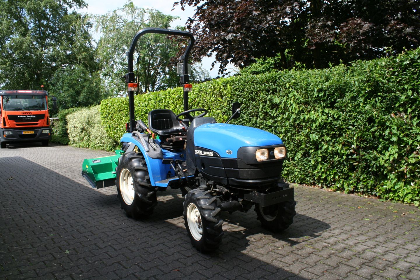 New Holland TC18D + flail mower 125 cm