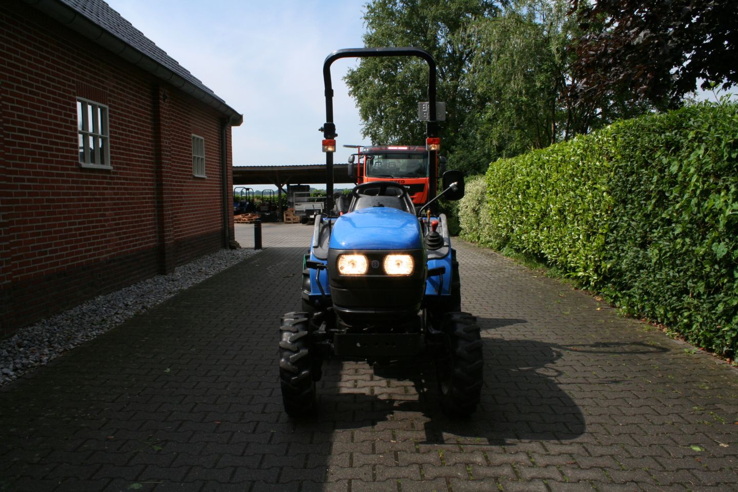 New Holland TC18D + flail mower 125 cm