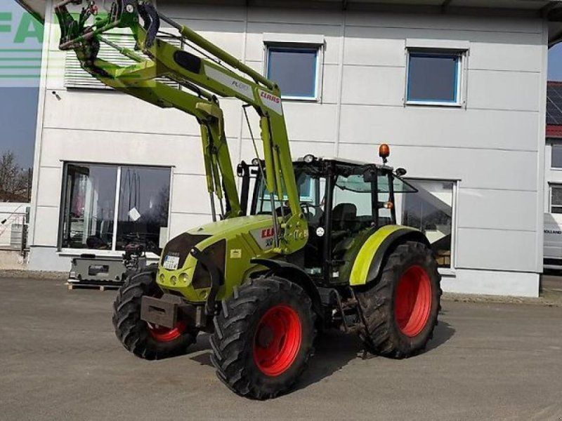 Claas axos 310 mit fl 80 frontlader