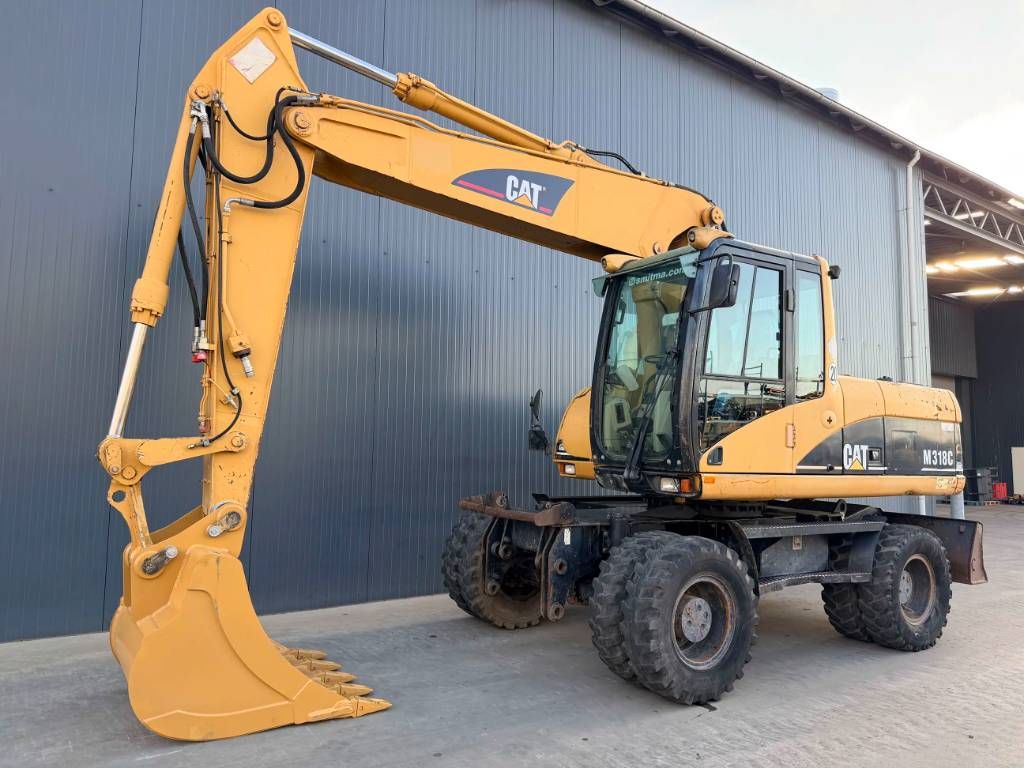 CAT M318C