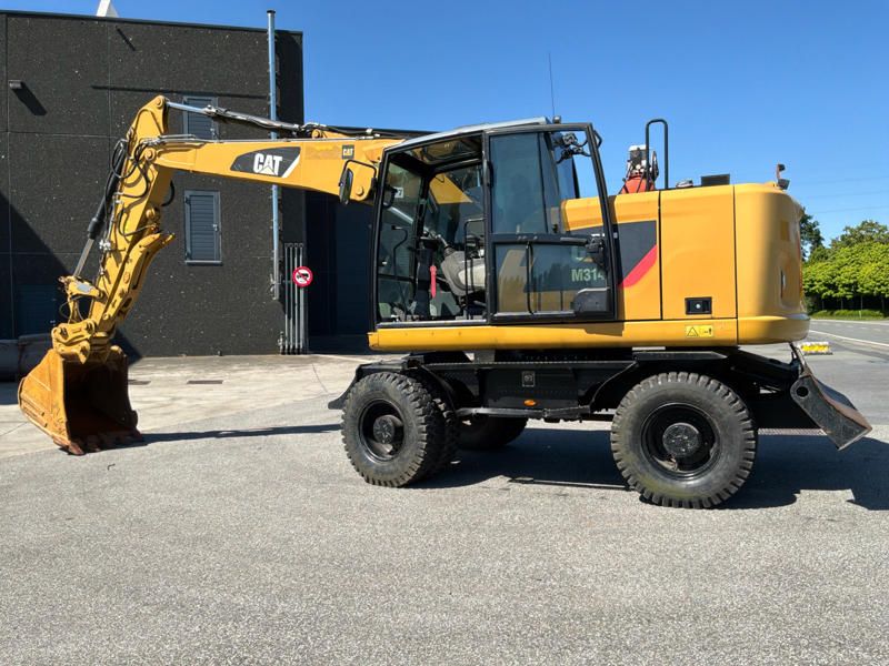 2016 Caterpillar M314F Reifenkran