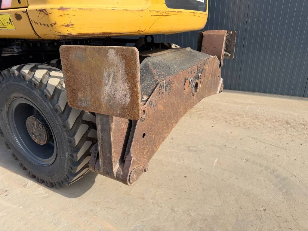 CAT M313D