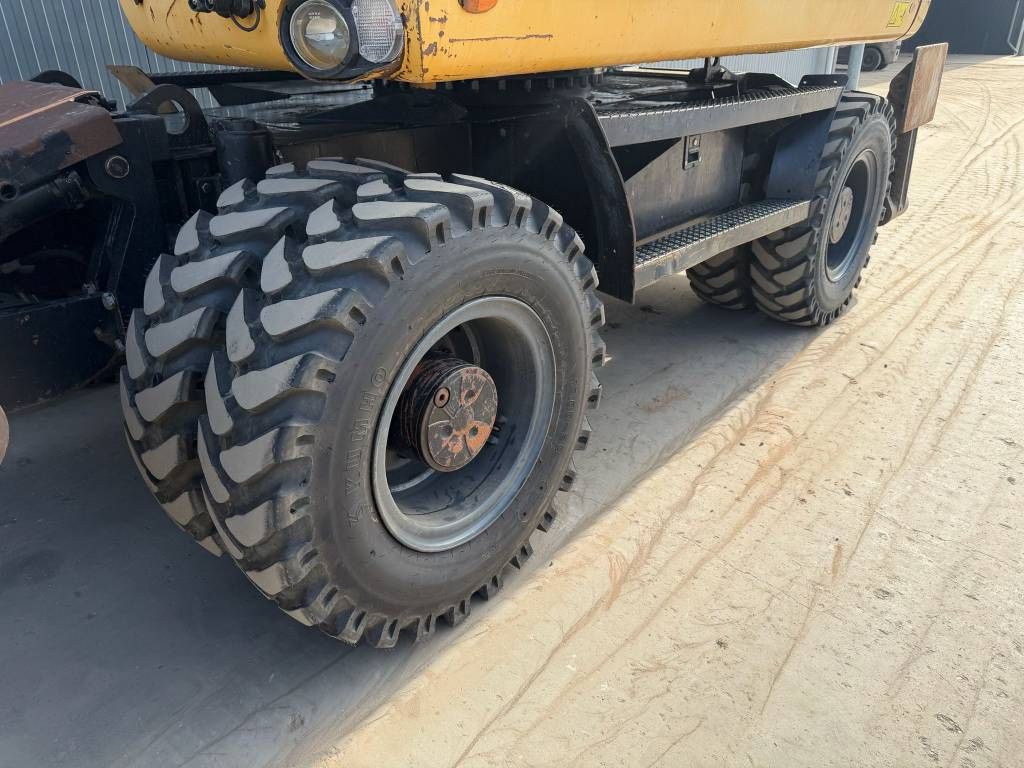 CAT M313D
