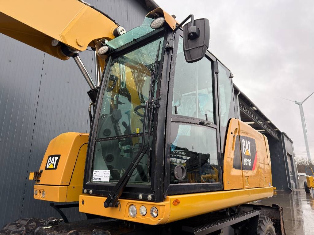 CAT M318F