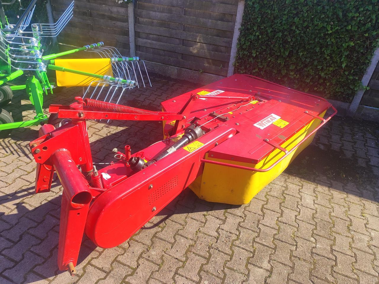 Deutz Fahr KM 24 en Wimat 165 trommelmaaier