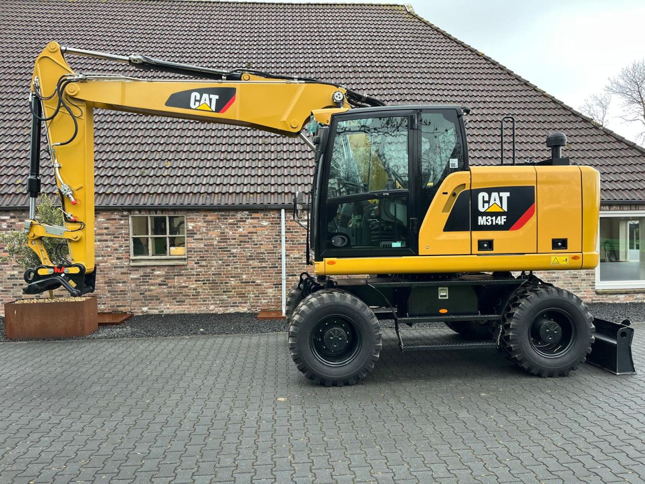 Caterpillar M314F met 3.500km!