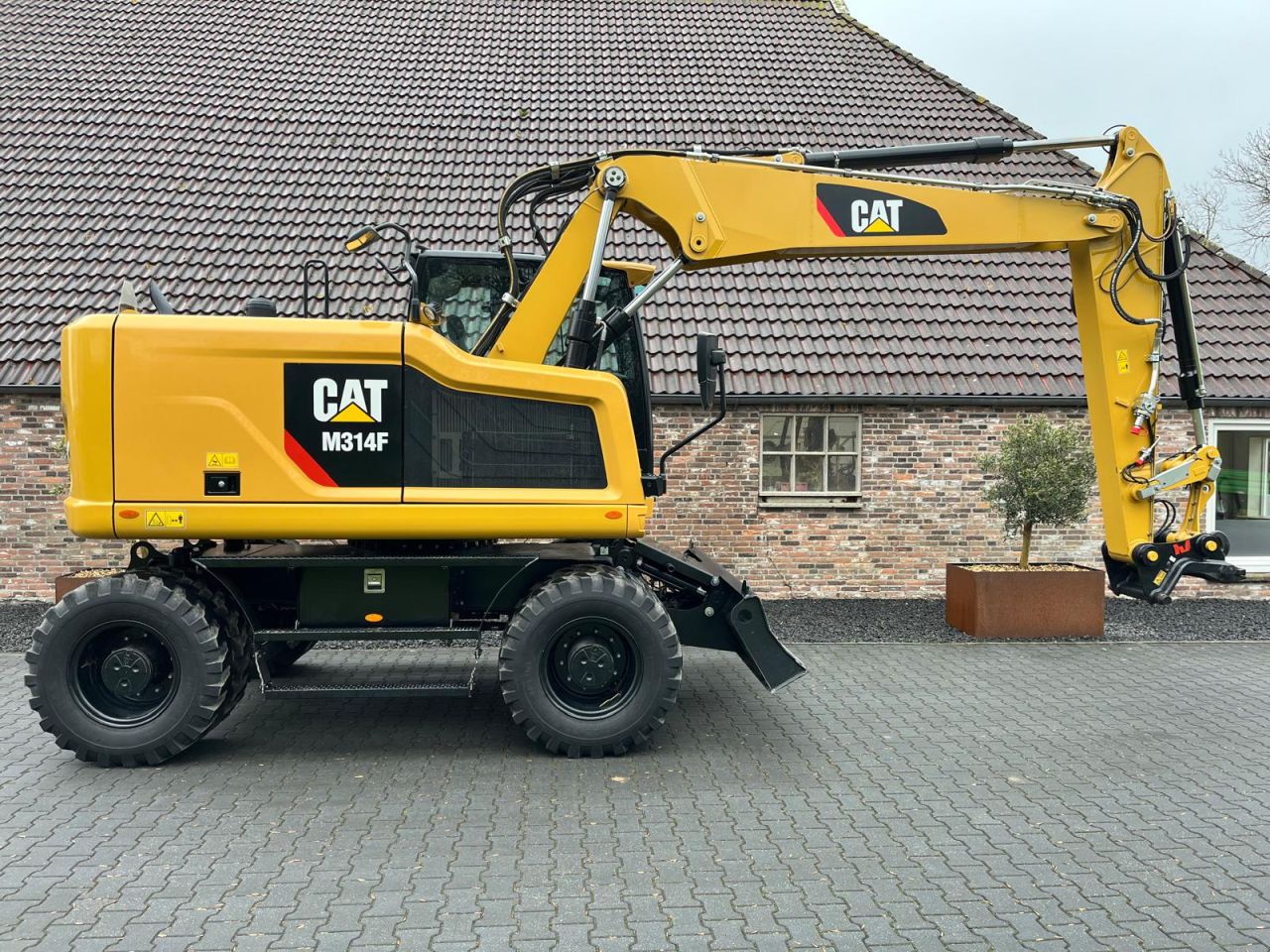 Caterpillar M314F met 3.500km!