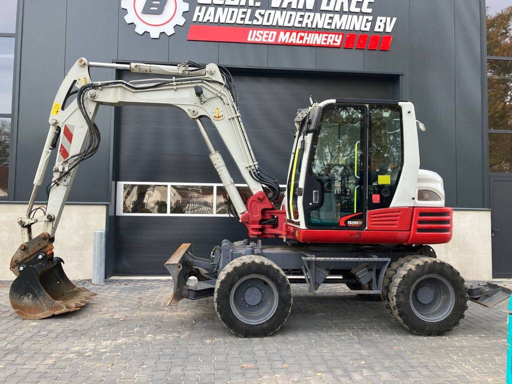 Wheel excavator Takeuchi TB295W Diesel 74kW 2014