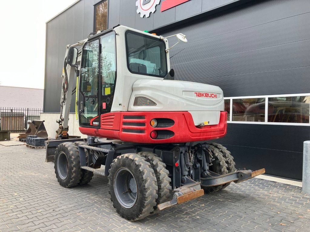 Wheel excavator Takeuchi TB295W Diesel 74kW 2014