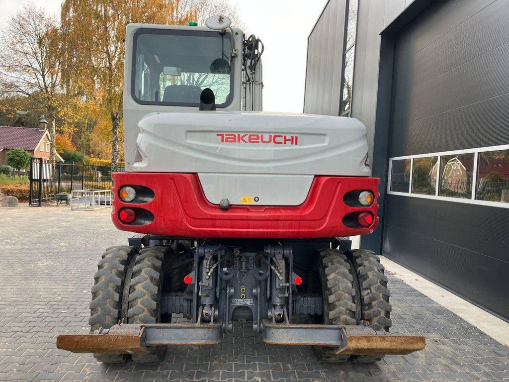 Wheel excavator Takeuchi TB295W Diesel 74kW 2014