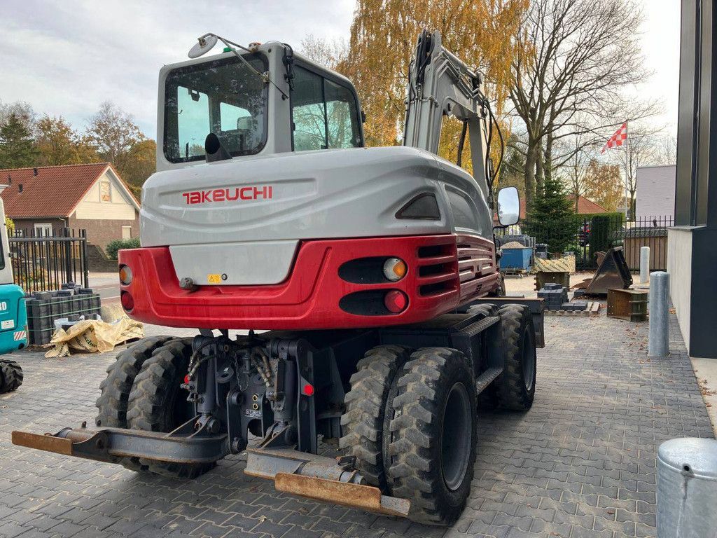 Wheel excavator Takeuchi TB295W Diesel 74kW 2014