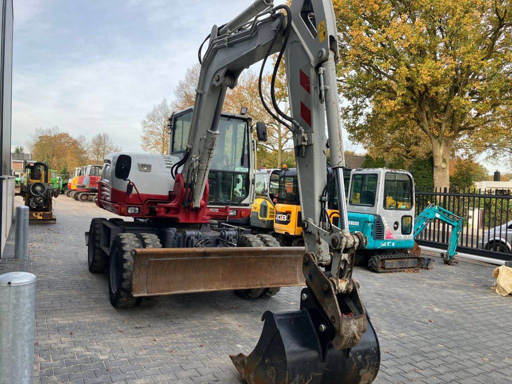 Wheel excavator Takeuchi TB295W Diesel 74kW 2014