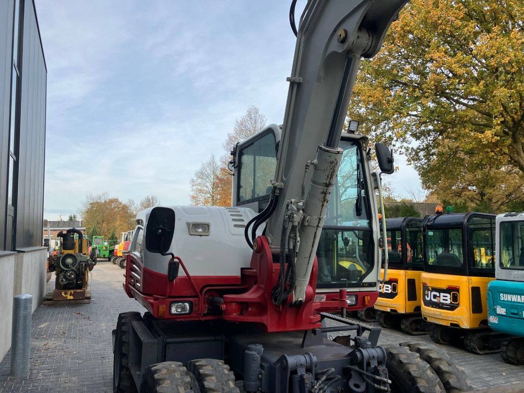 Wheel excavator Takeuchi TB295W Diesel 74kW 2014