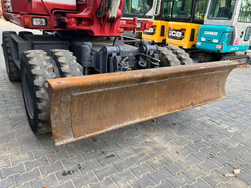 Wheel excavator Takeuchi TB295W Diesel 74kW 2014