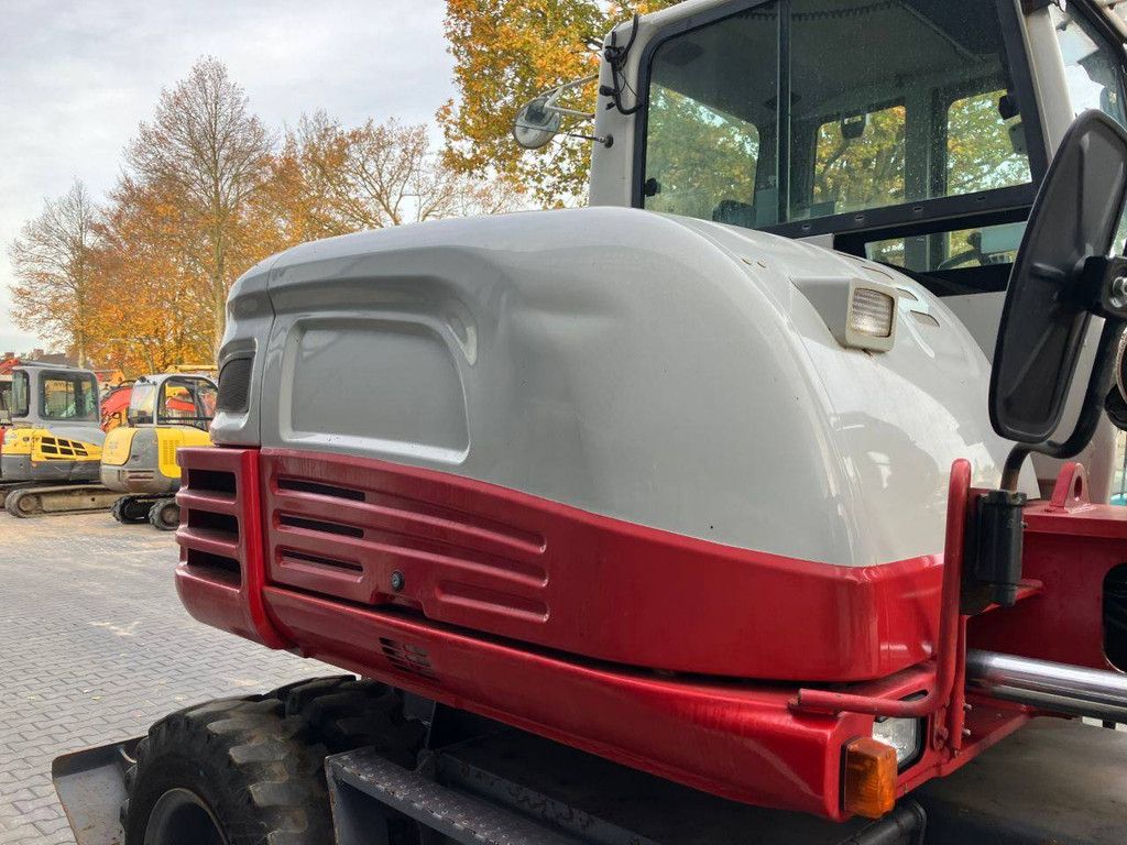 Wheel excavator Takeuchi TB295W Diesel 74kW 2014