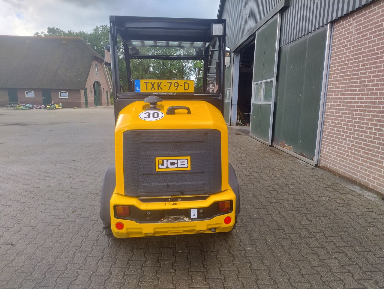 JCB 403 minishovel + bak en lepels