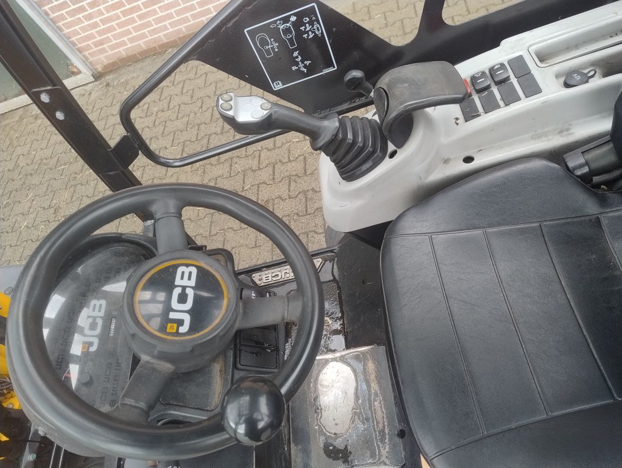 JCB 403 minishovel + bak en lepels