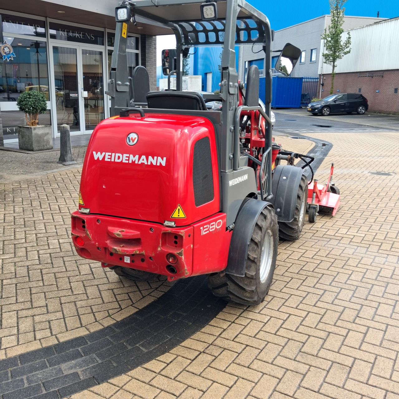 Weidemann 1280 Minishovel met Maaidek.