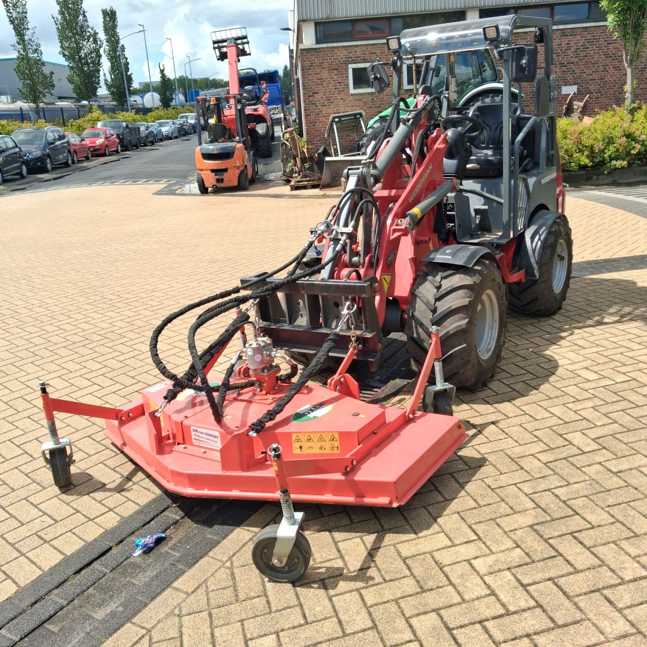 Weidemann 1280 Minishovel met Maaidek.