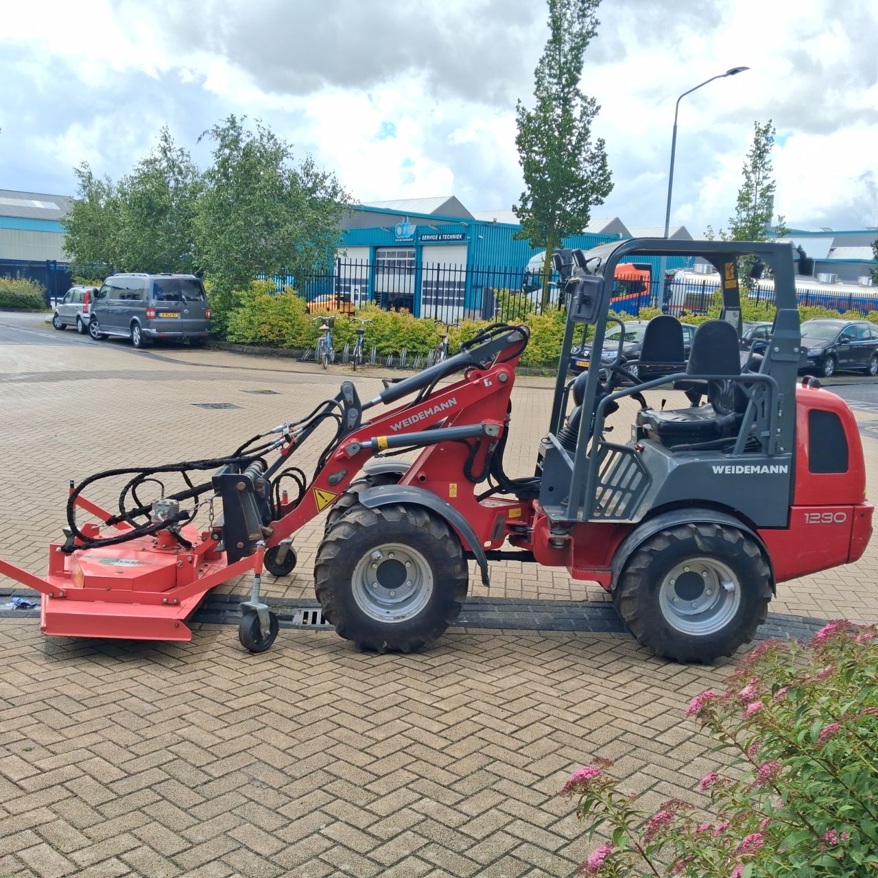 Weidemann 1280 Minishovel met Maaidek.