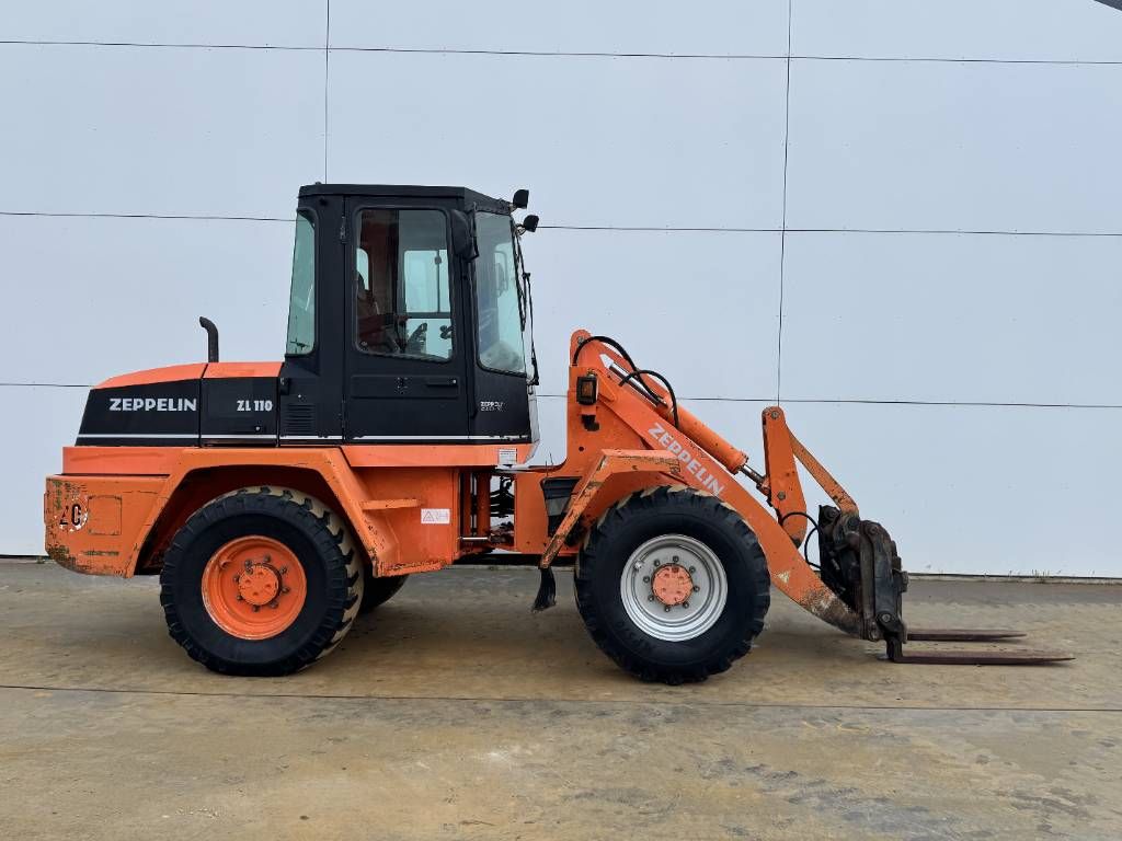 Schaeff ZL110 - Forks + Bucket / Quick Coupler