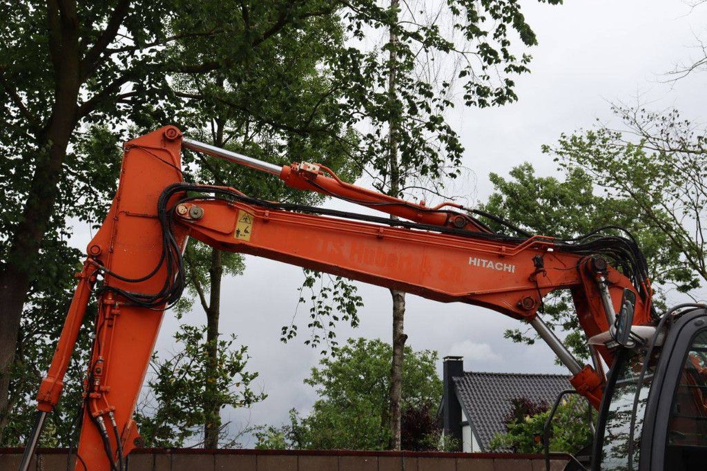 Wheel excavator Hitachi ZAXIS ZX140W-3 Diesel 90kW 2009