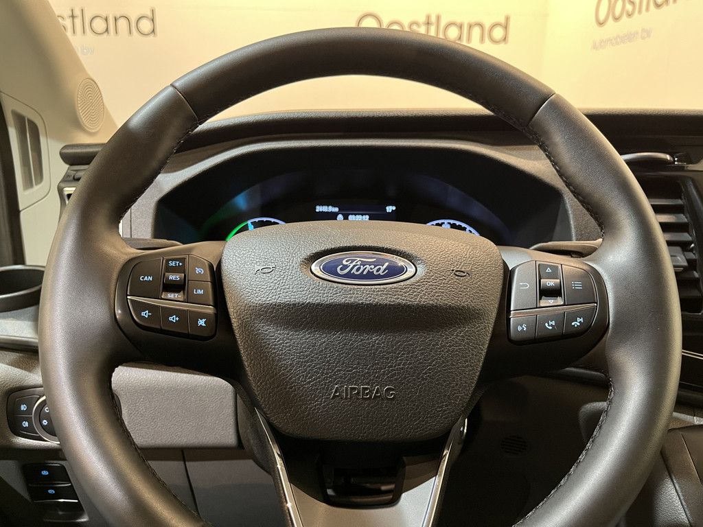 Ford E-Transit 390 (3500 kg) L2H2 Trend 68 kWh / 100% Elektrisch !! / Airco / Cruise Control / CarPlay / Camera / Navigatie / 3-Zits / 2.500 KM !!