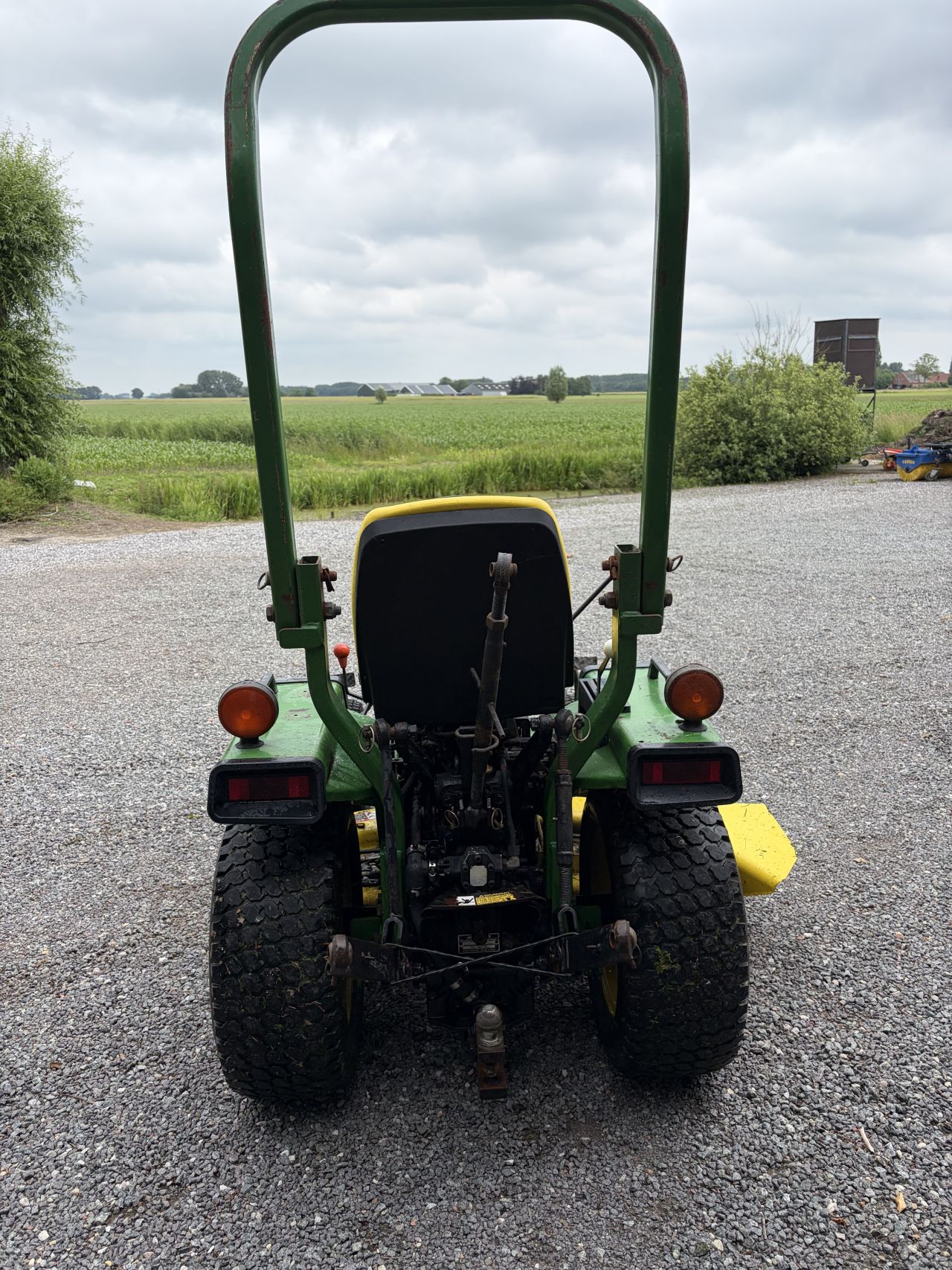 John Deere 655 compact tractor met maaidek