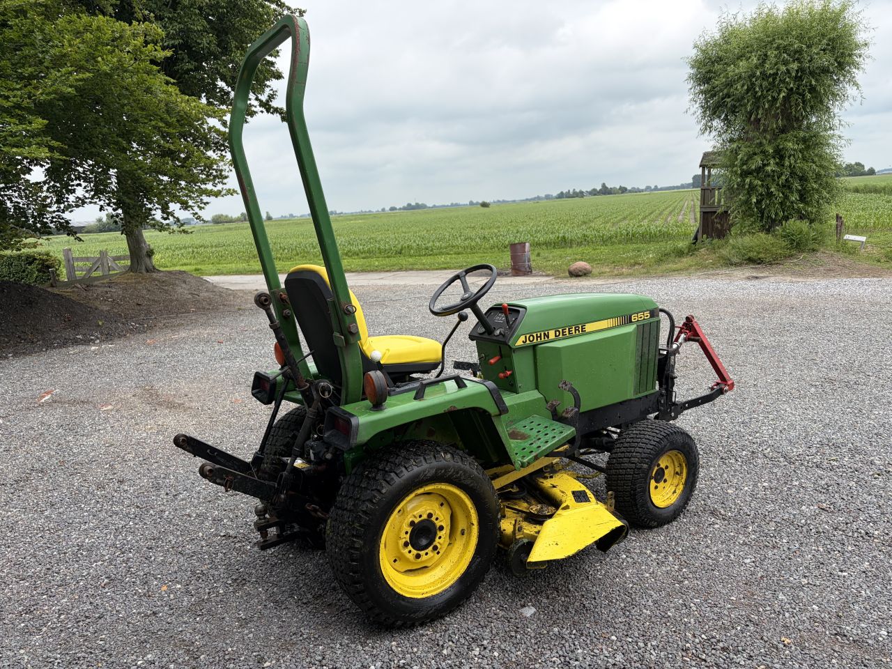 John Deere 655 compact tractor met maaidek