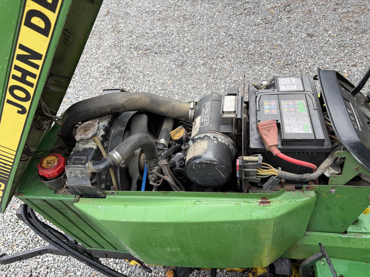 John Deere 655 compact tractor met maaidek