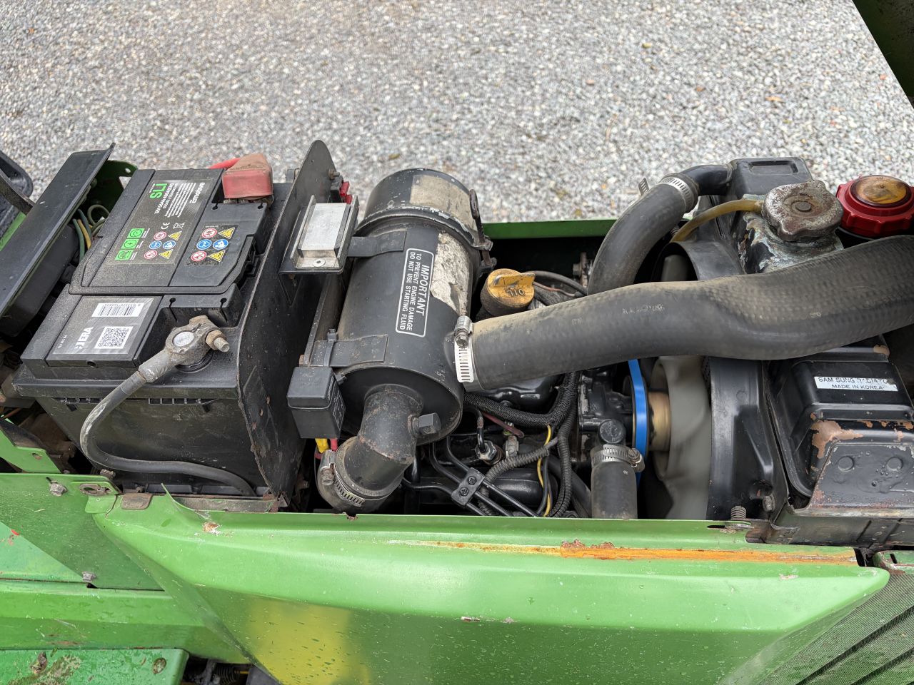 John Deere 655 compact tractor met maaidek